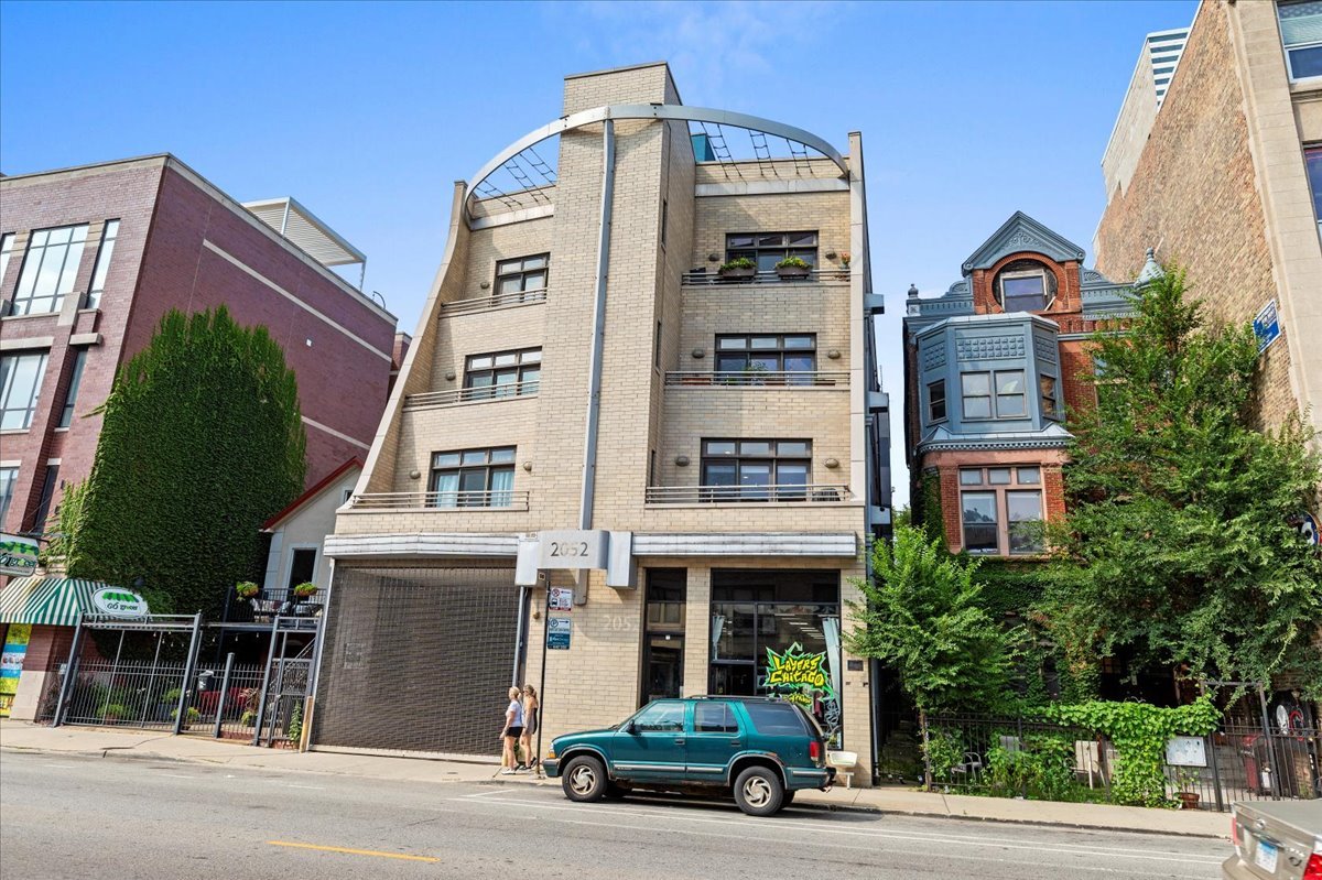 a car parked in front of a building