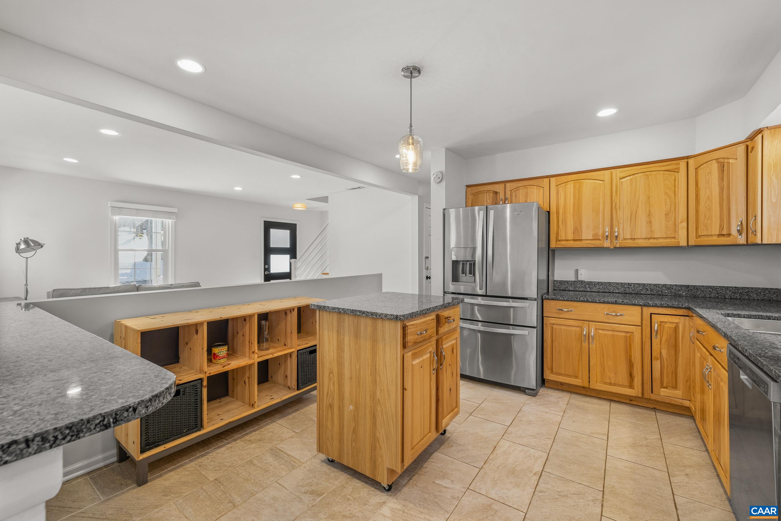 1284 Tilman Road Charlottesville, VA 22901 - Photo 14 of 36 a kitchen with stainless steel appliances granite countertop a refrigerator and a sink