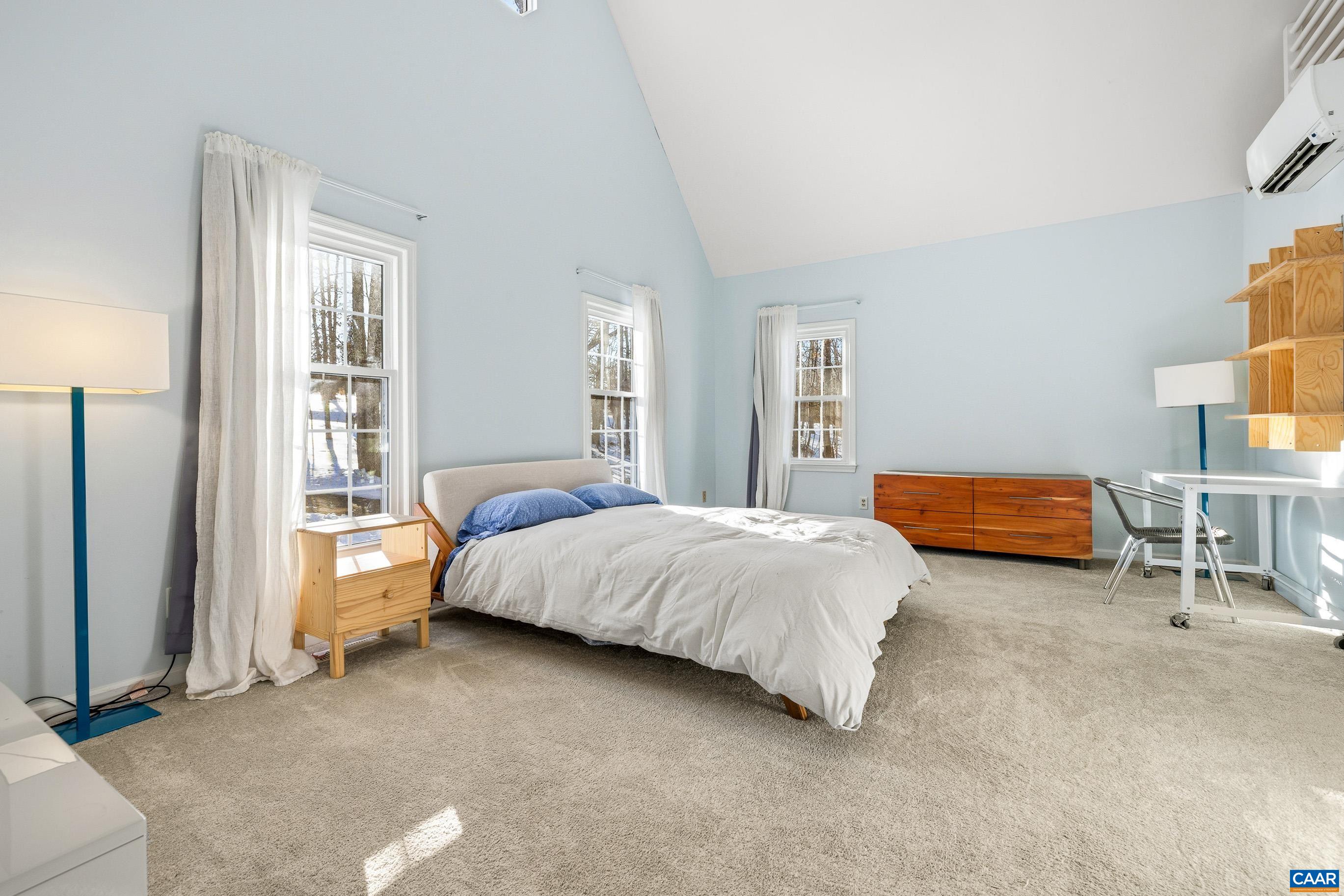 1284 Tilman Road Charlottesville, VA 22901 - Photo 19 of 36 a bedroom with a bed and a window