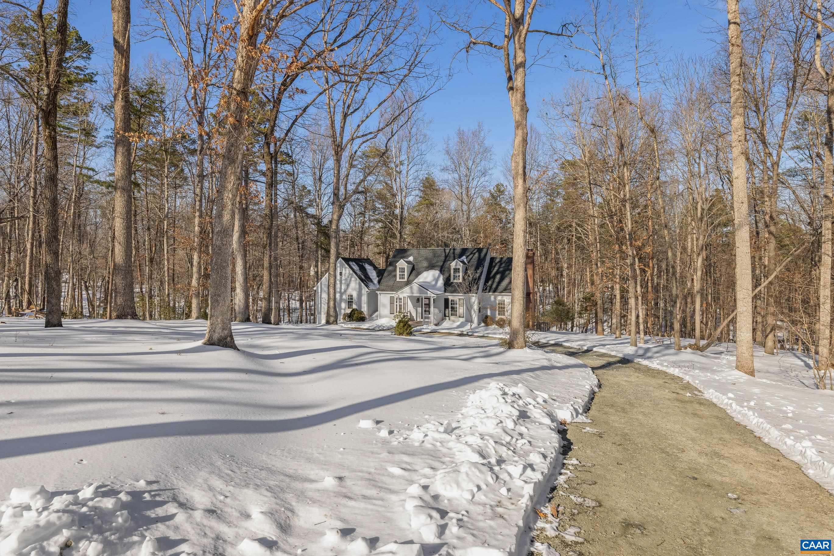 1284 Tilman Road Charlottesville, VA 22901 - Photo 2 of 36 a view of city with snow on the road