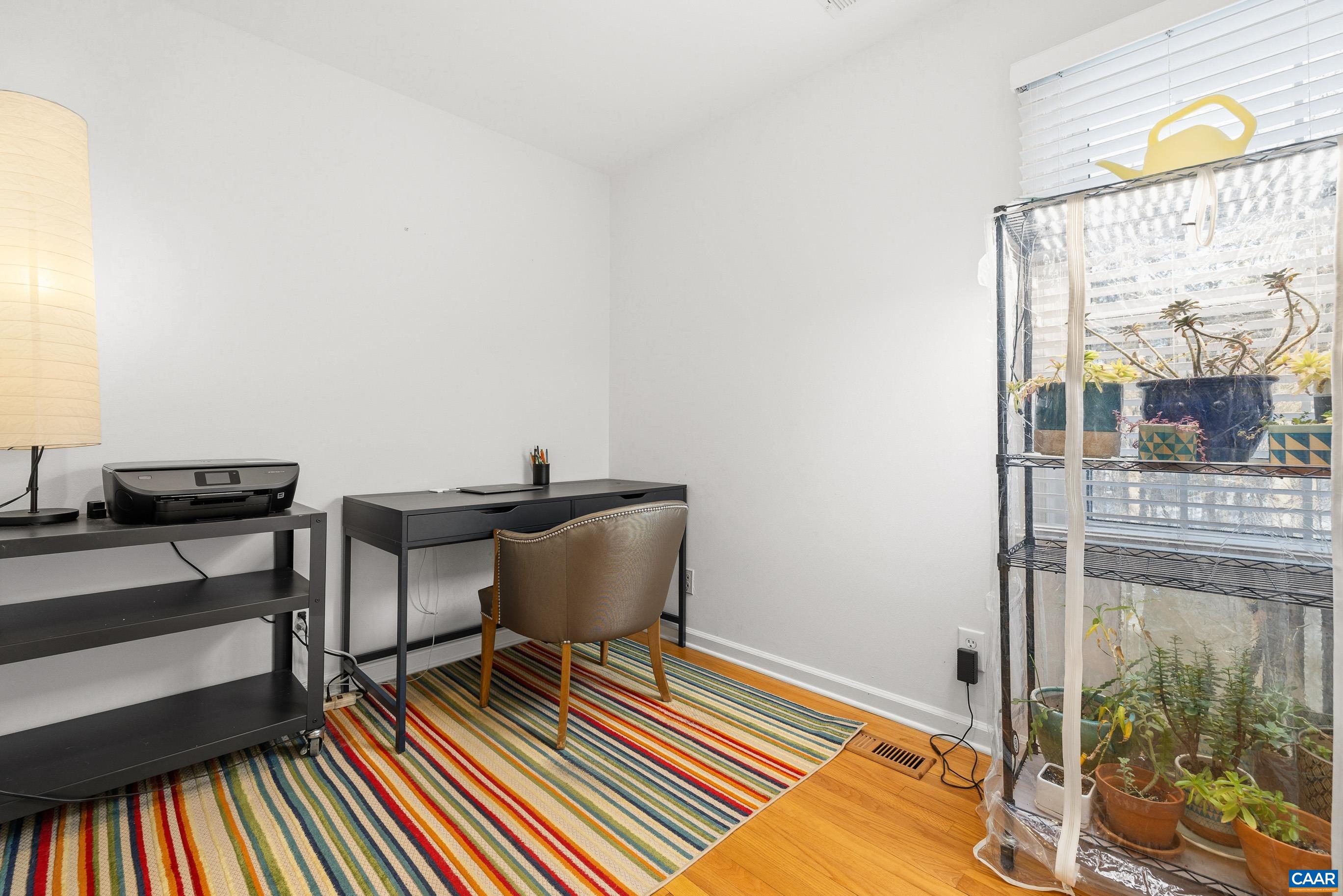 1284 Tilman Road Charlottesville, VA 22901 - Photo 24 of 36 a living room with furniture