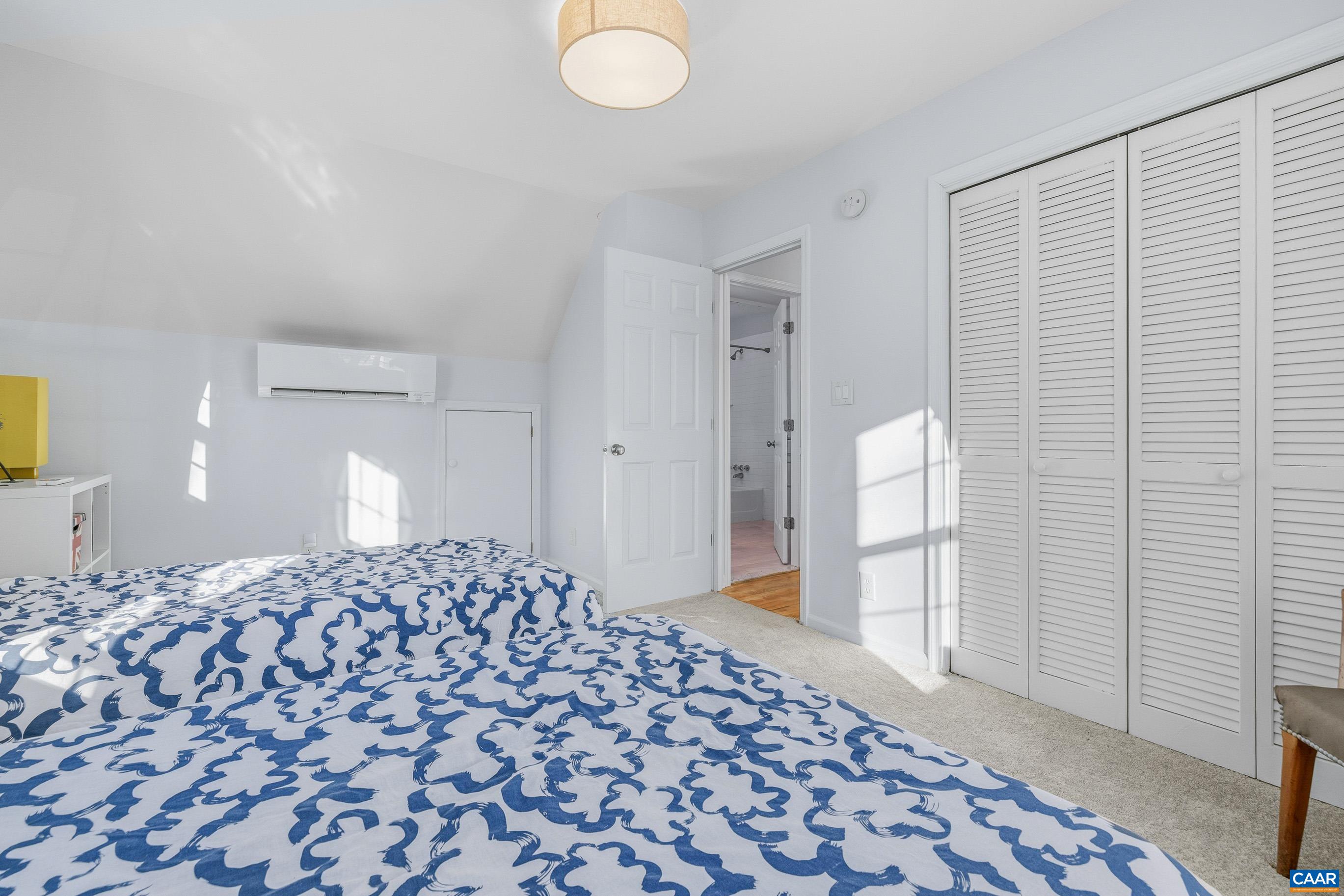 1284 Tilman Road Charlottesville, VA 22901 - Photo 27 of 36 a bedroom with a bed and a window