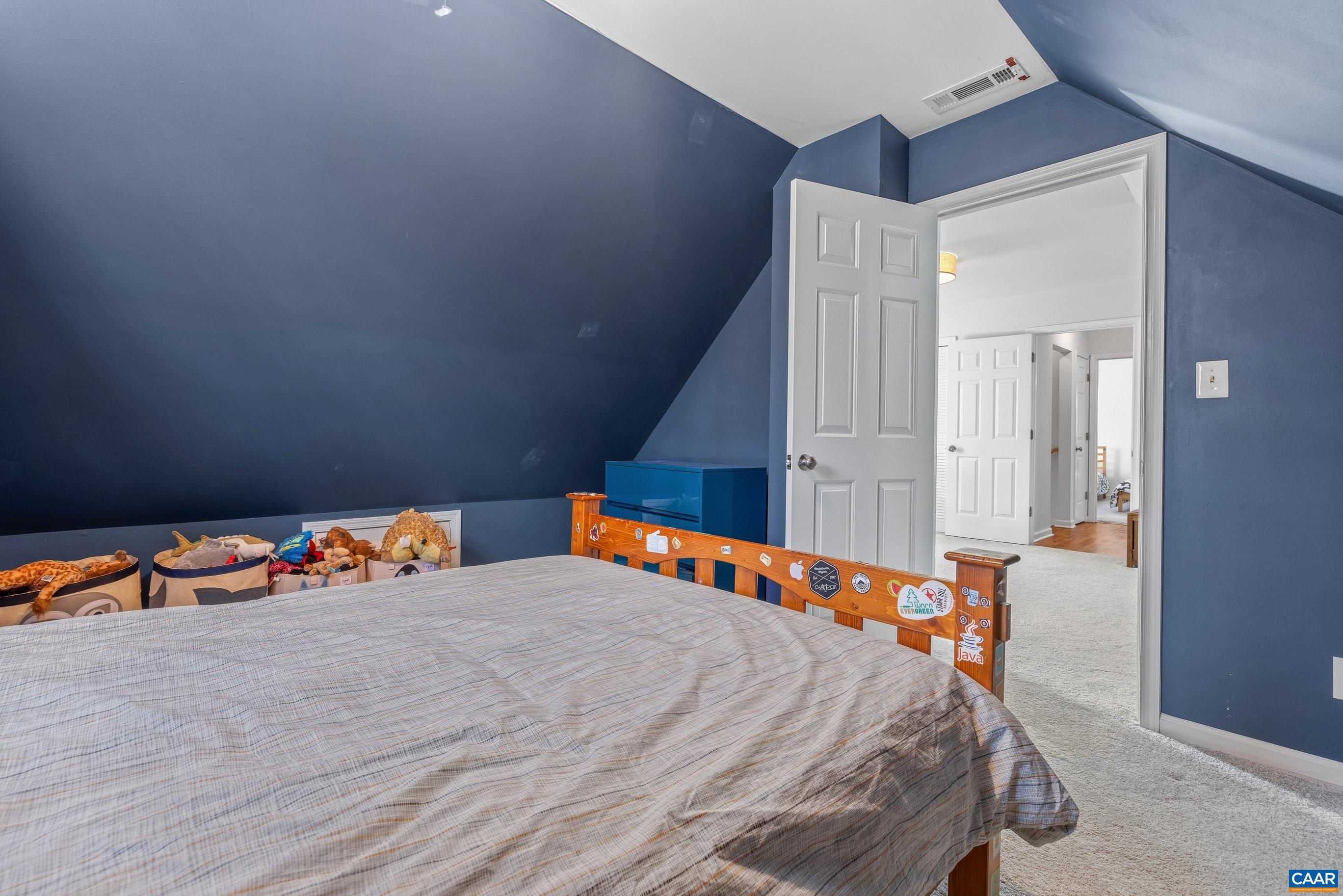 1284 Tilman Road Charlottesville, VA 22901 - Photo 33 of 36 wooden floor to ceiling window and a rug