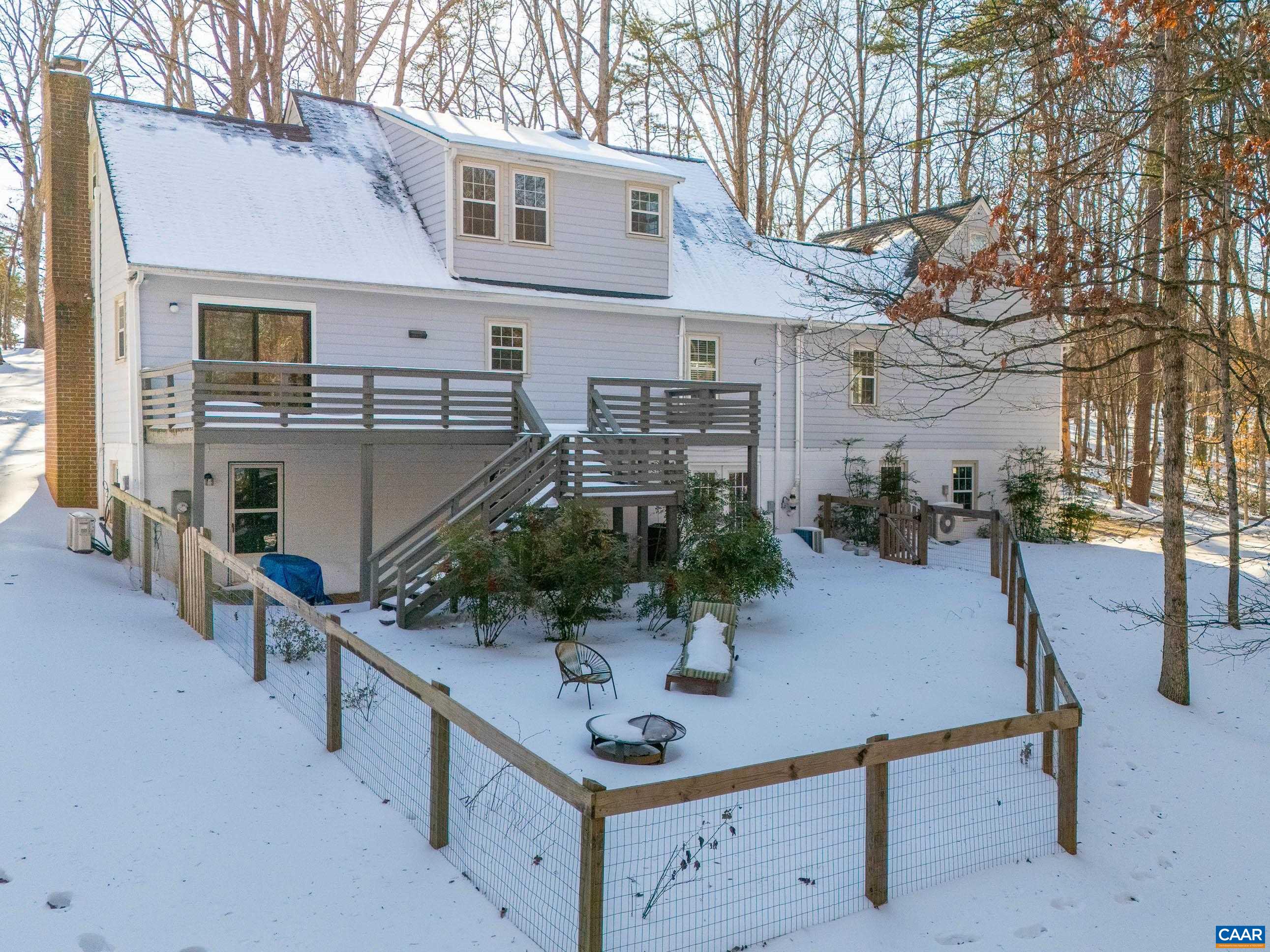 1284 Tilman Road Charlottesville, VA 22901 - Photo 34 of 36 a view of a chairs and table in the house