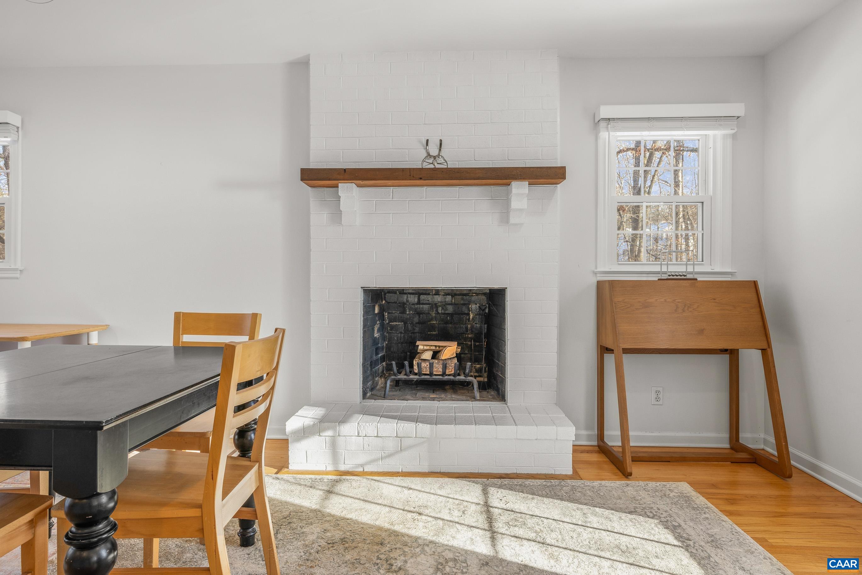 1284 Tilman Road Charlottesville, VA 22901 - Photo 9 of 36 a living room with furniture and a fireplace