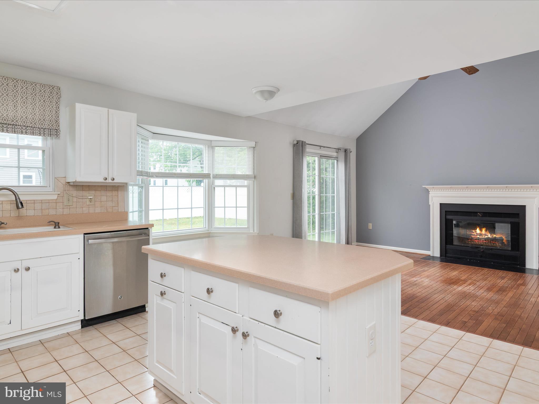 2324 Nantucket Drive Crofton, MD 21114 - Photo 13 of 63 a kitchen with granite countertop white cabinets and white appliances