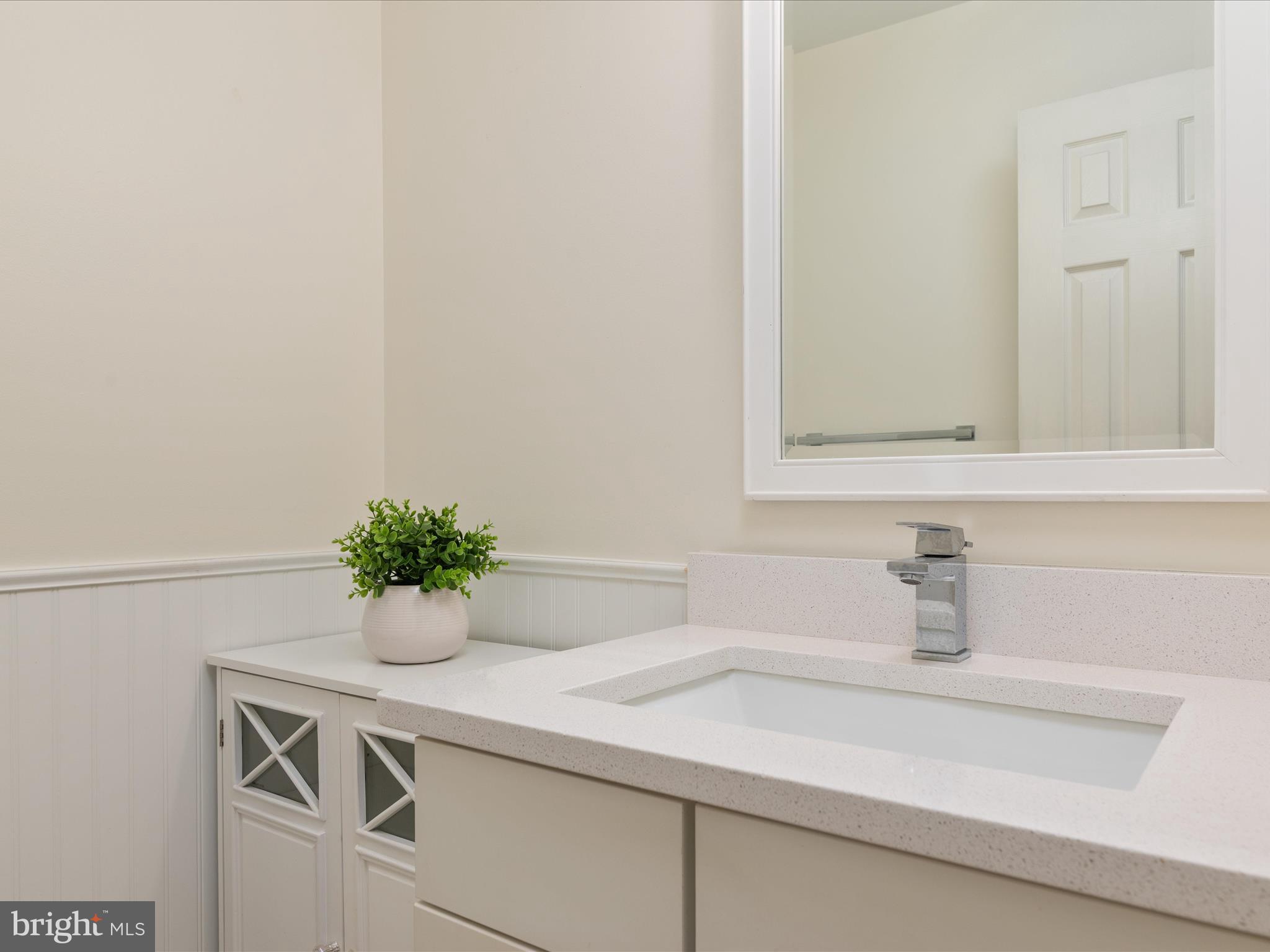 2324 Nantucket Drive Crofton, MD 21114 - Photo 21 of 63 a bathroom with a sink and mirror