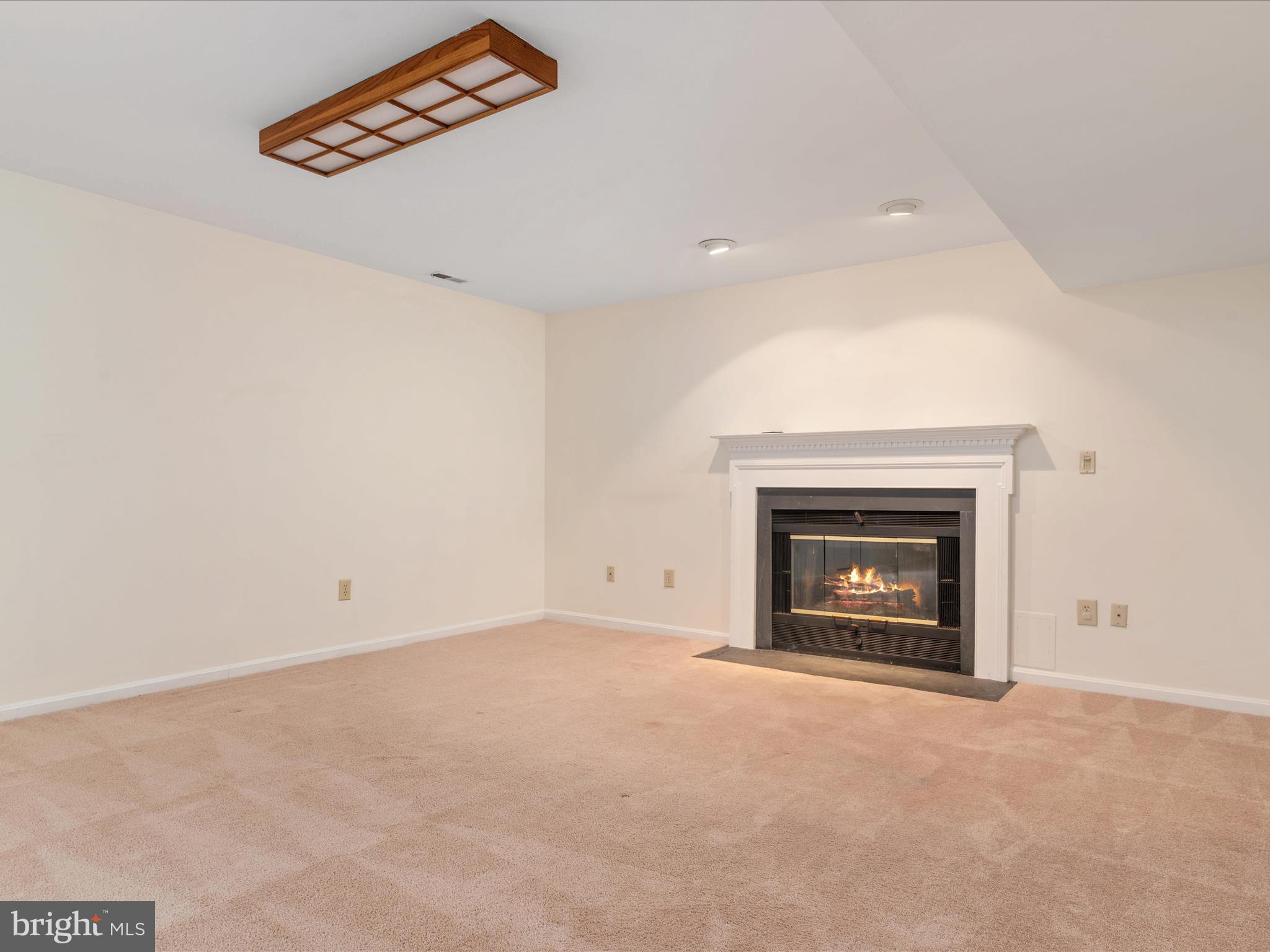 2324 Nantucket Drive Crofton, MD 21114 - Photo 34 of 63 an empty room with a fireplace