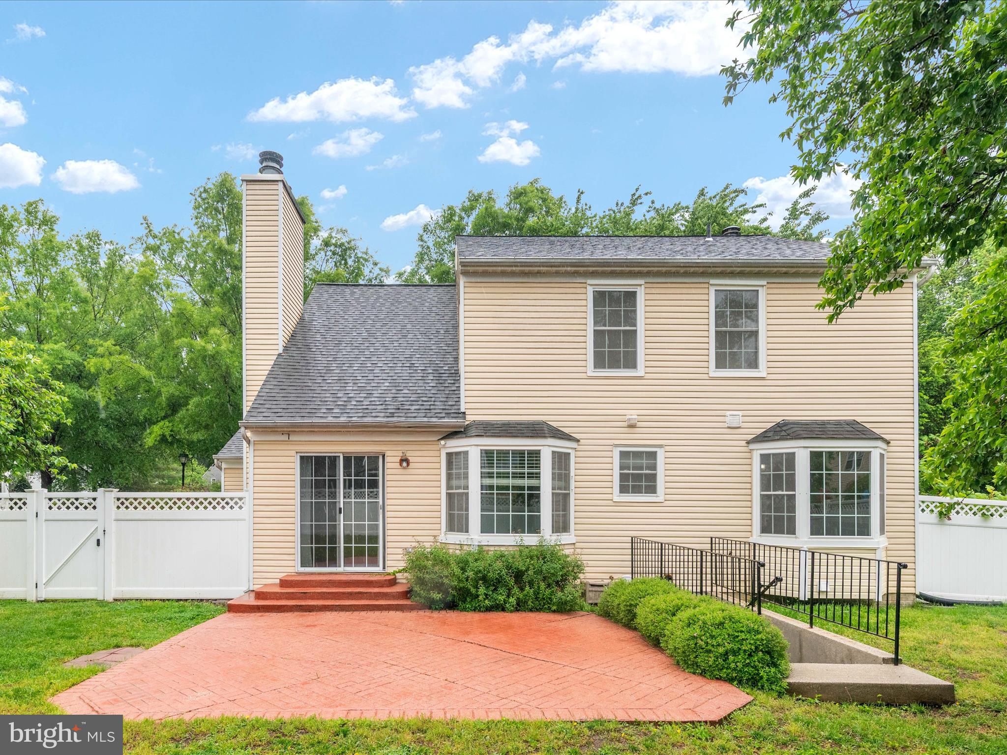 2324 Nantucket Drive Crofton, MD 21114 - Photo 40 of 63 a front view of a house with a yard and garage