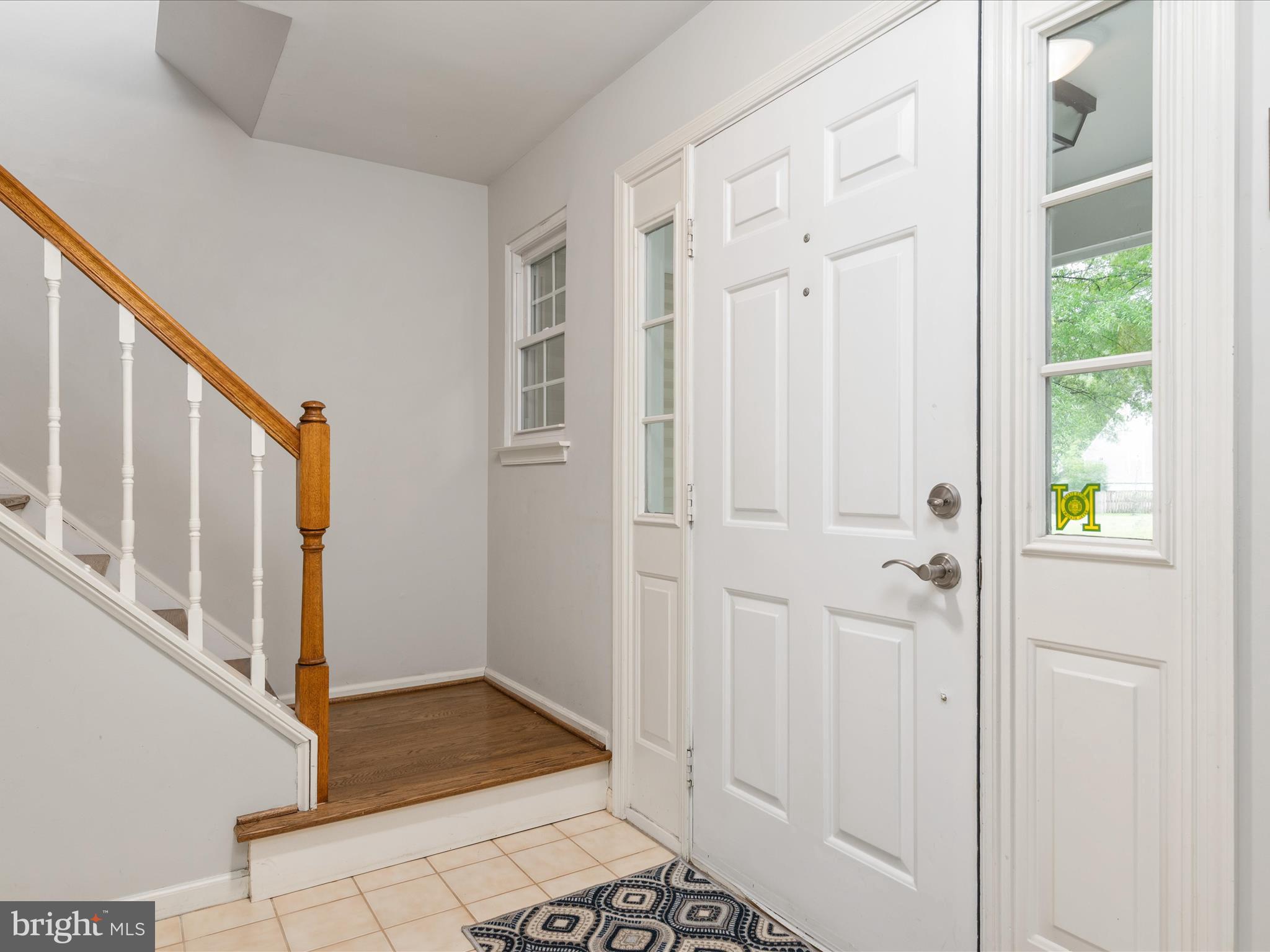 2324 Nantucket Drive Crofton, MD 21114 - Photo 5 of 63 a view of entryway with wooden floor and stair