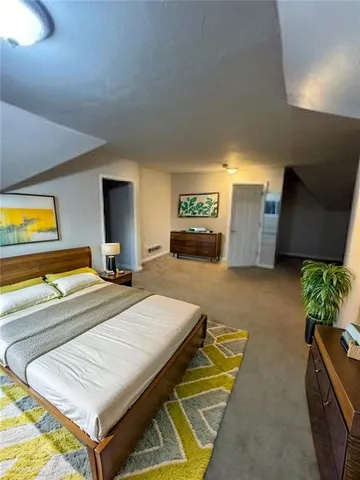 a room with pool table and a flat screen tv