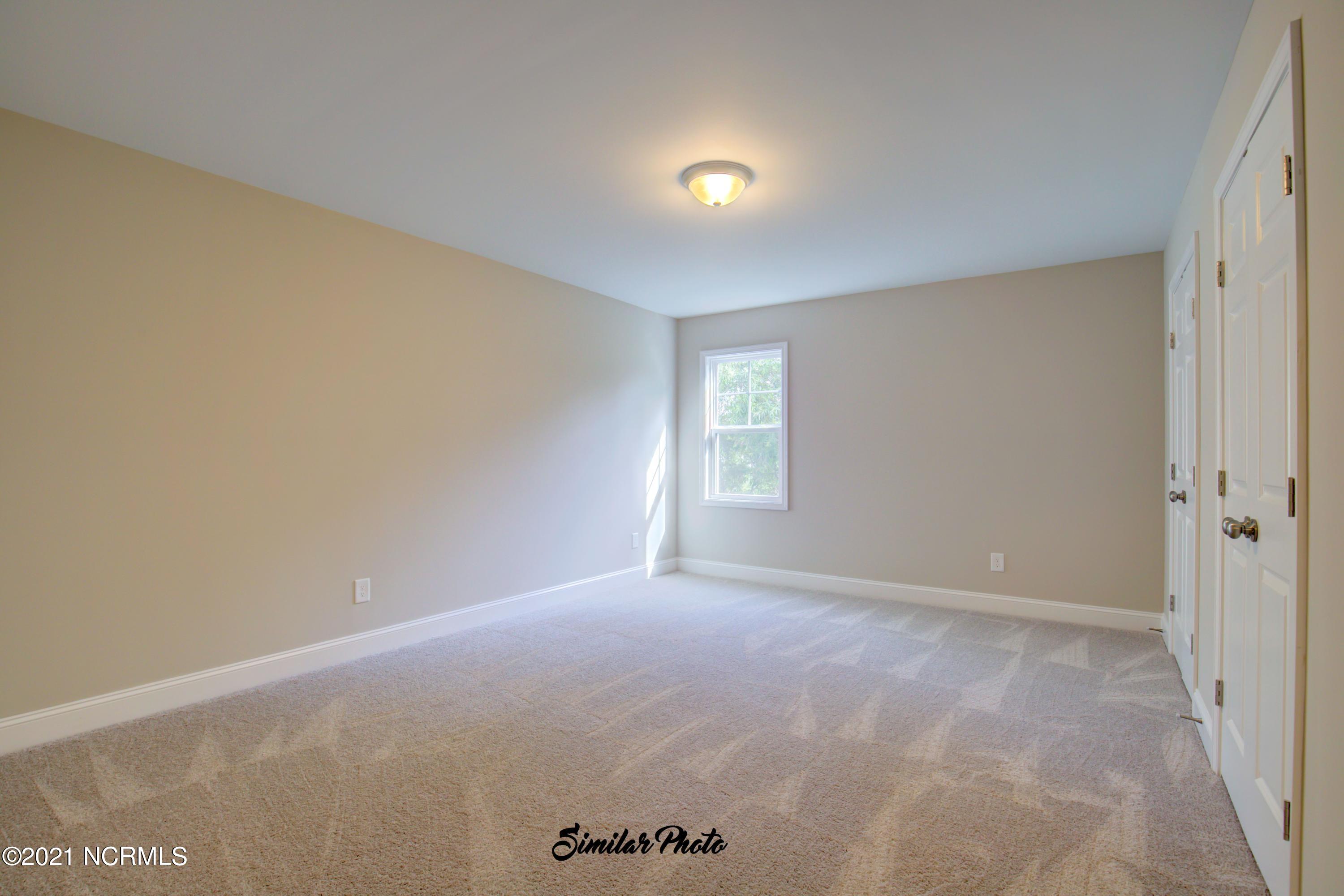 428 Guppy Loop Road Sneads Ferry, NC 28460 - Photo 11 of 24 9 - Bedroom 2 (end)