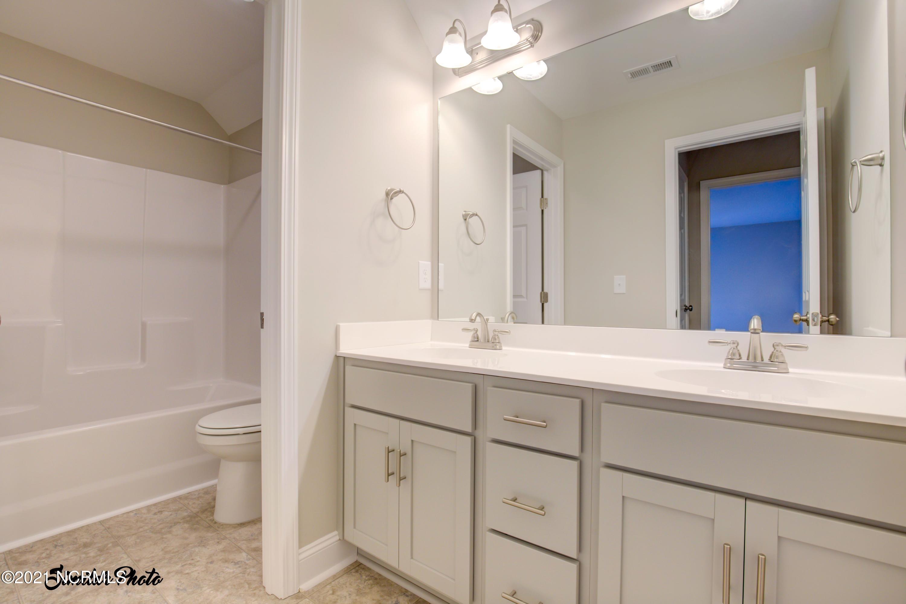 428 Guppy Loop Road Sneads Ferry, NC 28460 - Photo 12 of 24 10 - 2nd Bathroom (end)