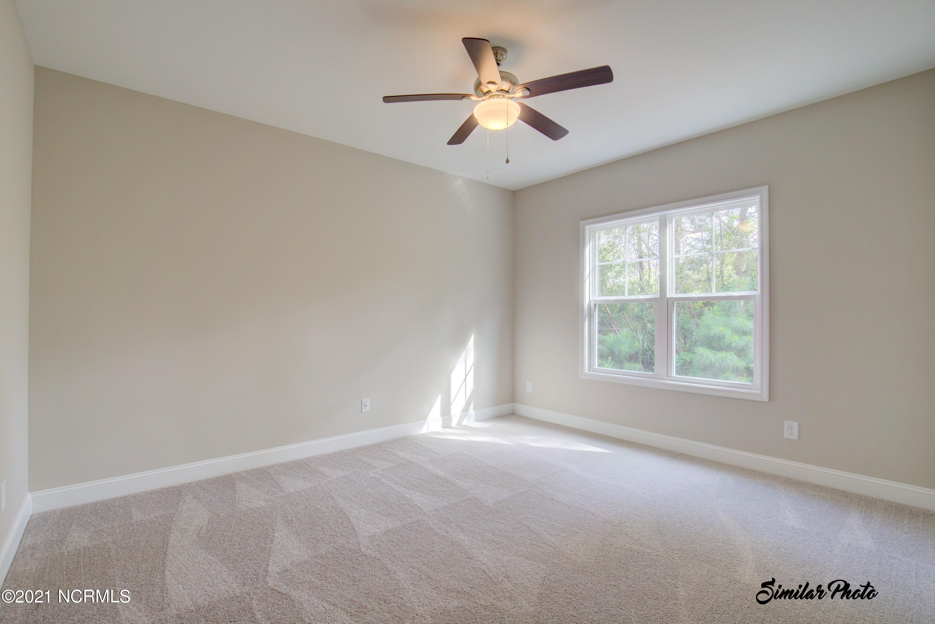 428 Guppy Loop Road Sneads Ferry, NC 28460 - Photo 14 of 24 12 - Master Bedroom (End)