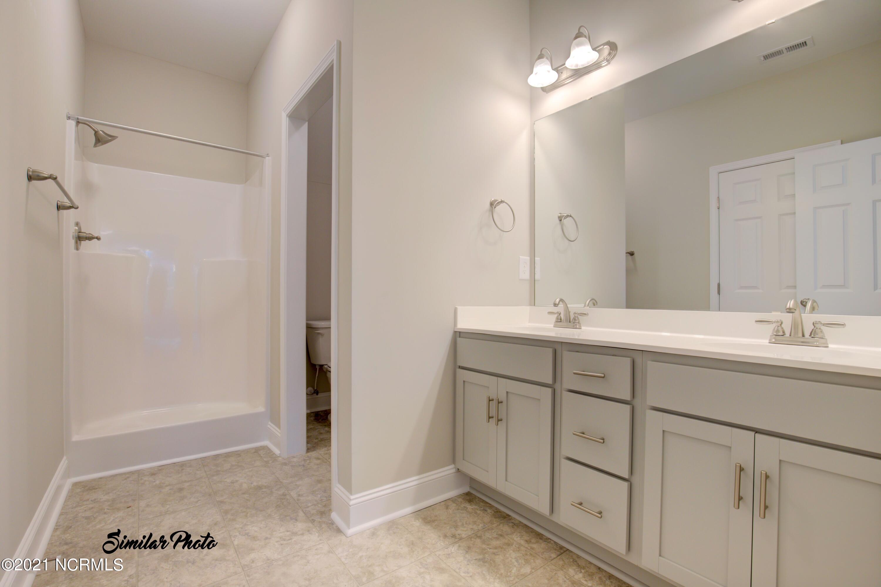 428 Guppy Loop Road Sneads Ferry, NC 28460 - Photo 15 of 24 13 - Master Bath (end)