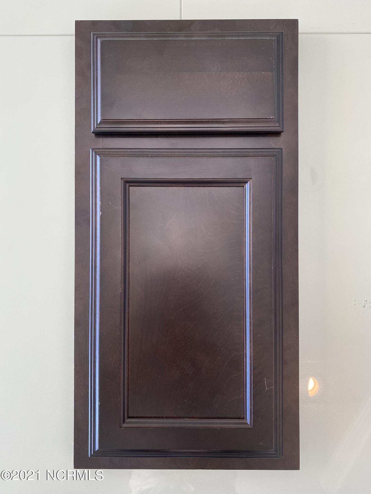 428 Guppy Loop Road Sneads Ferry, NC 28460 - Photo 21 of 24 Espresso Cabinet