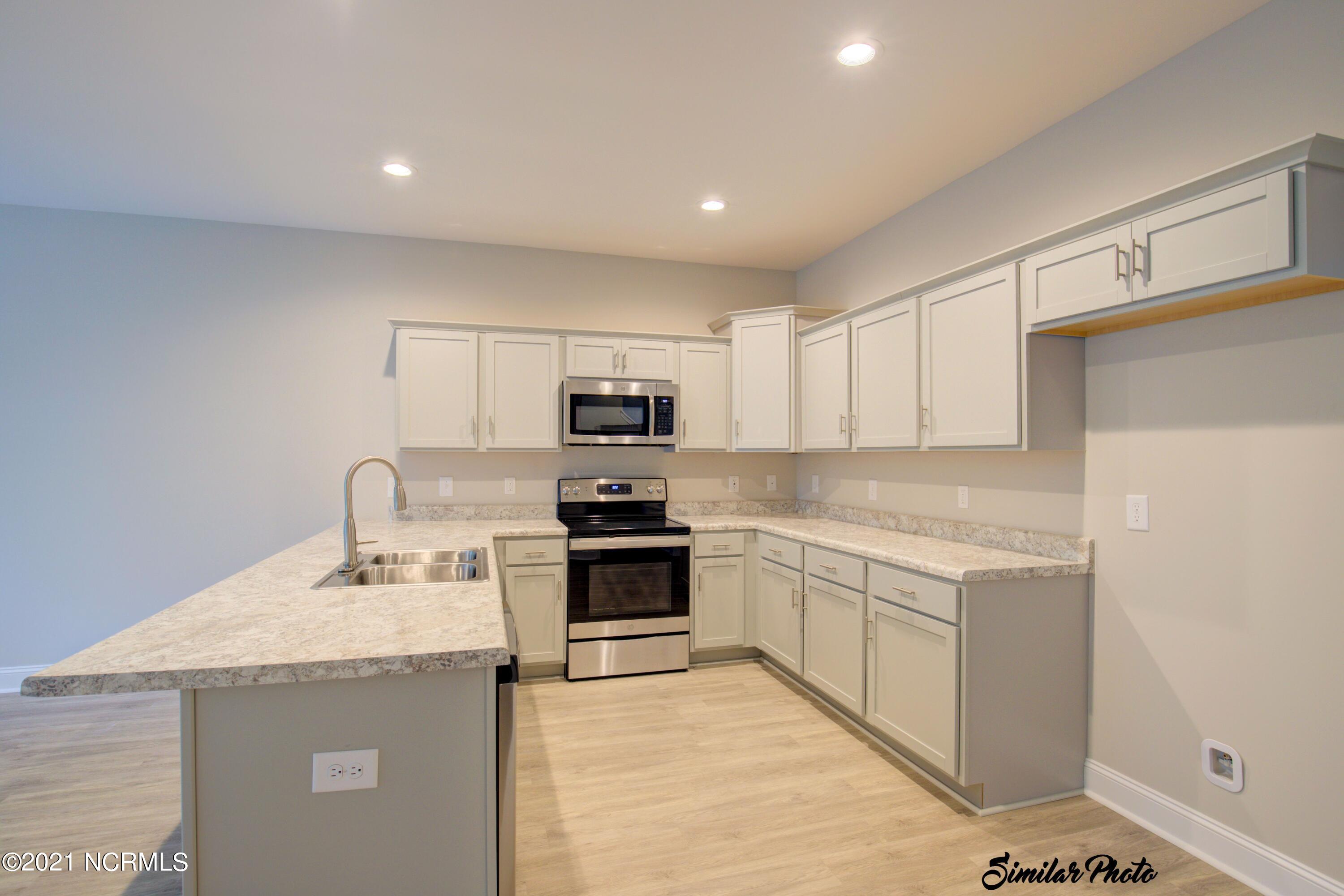 428 Guppy Loop Road Sneads Ferry, NC 28460 - Photo 3 of 24 2 - Kitchen 3 (end)