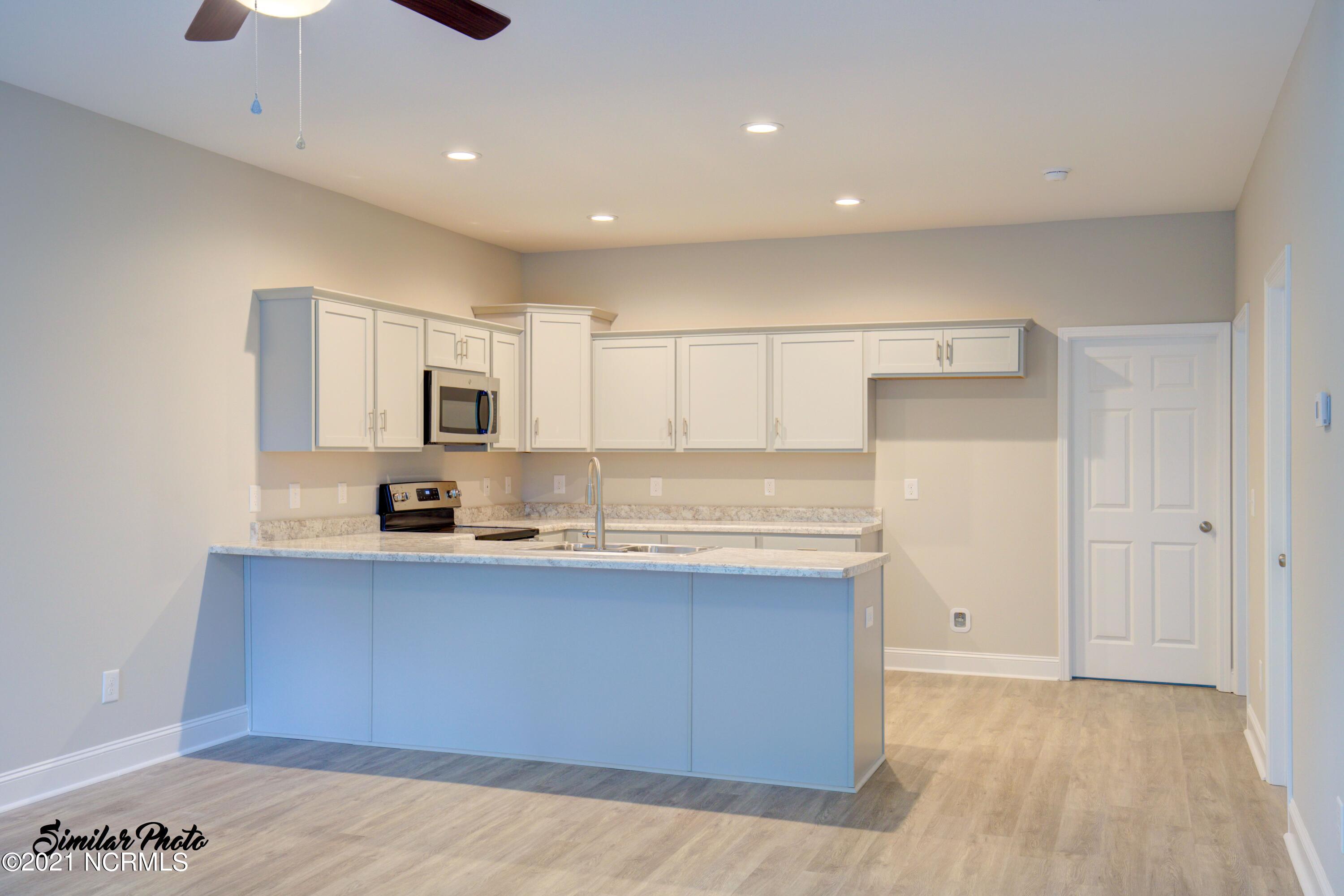 428 Guppy Loop Road Sneads Ferry, NC 28460 - Photo 5 of 24 4 - Kitchen 2 (end)