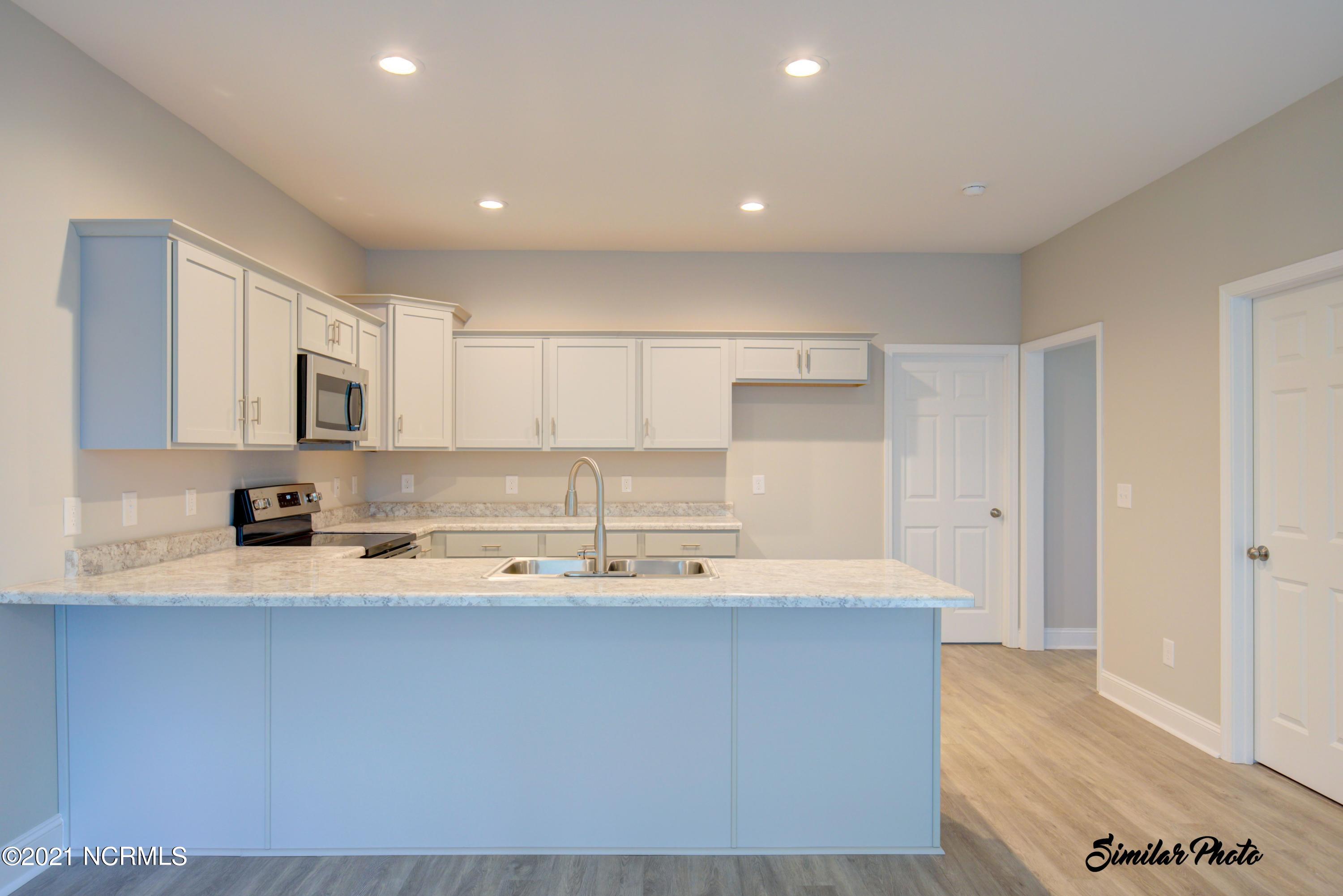 428 Guppy Loop Road Sneads Ferry, NC 28460 - Photo 6 of 24 5 - Kitchen 1 (end)