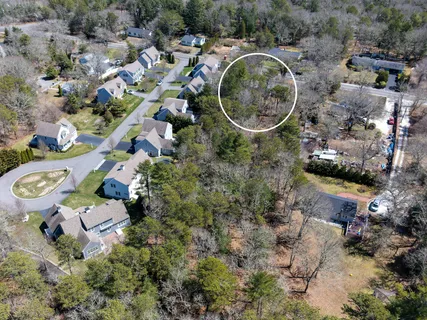 an aerial view of multiple house with outdoor space