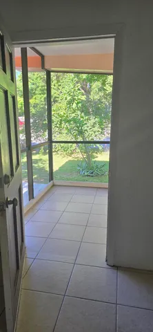 a bathroom with a shower and toilet