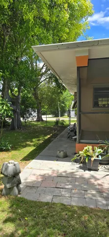 a view of a yard with an outdoor space