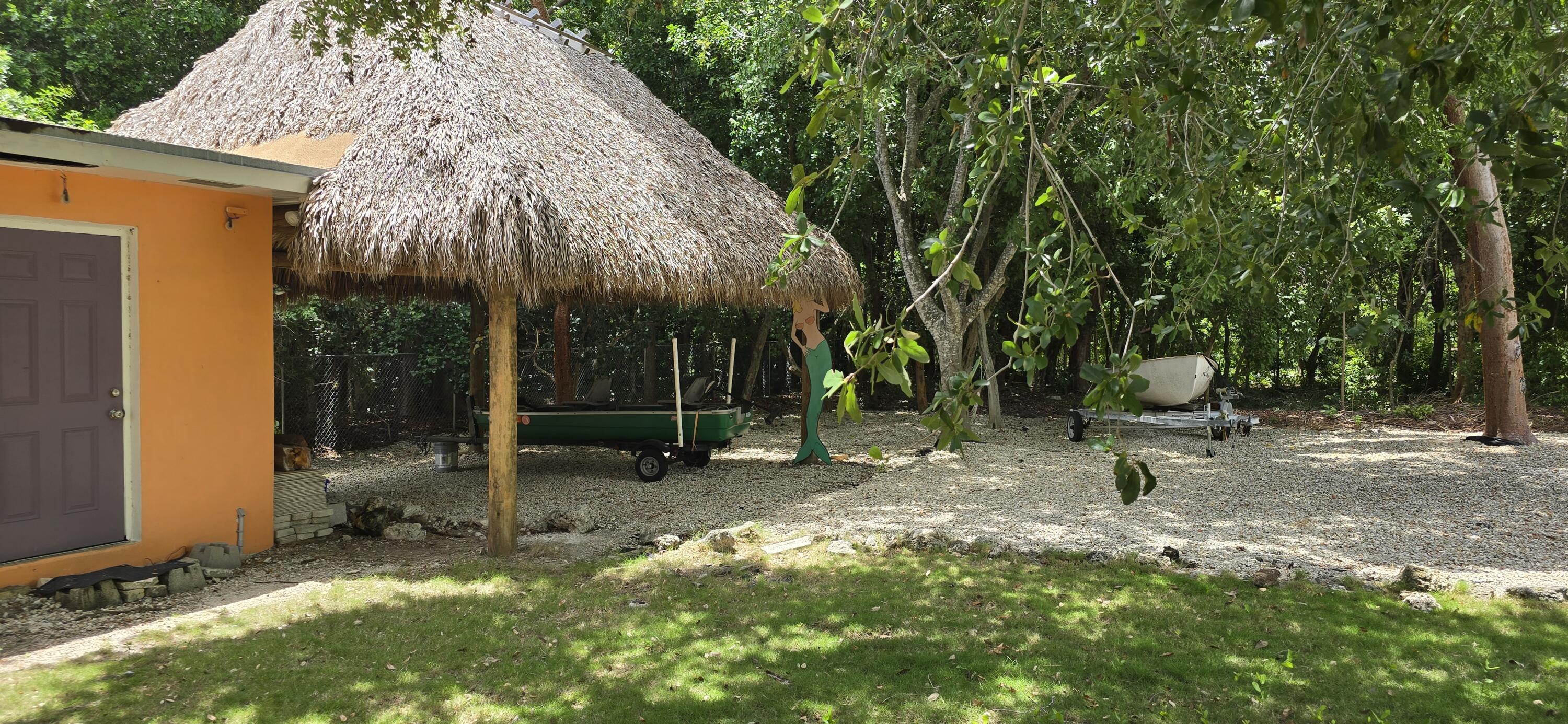 16 Pompano Avenue Key Largo, FL 33037 - Photo 4 of 23 a house view with a backyard space