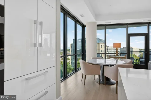 a stove top oven sitting inside of a kitchen
