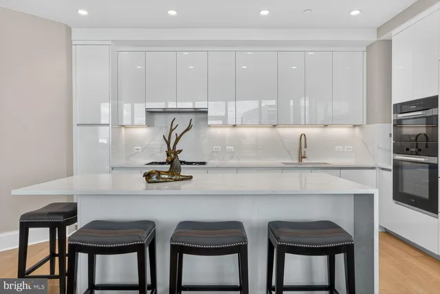 a view of a chairs and table in patio