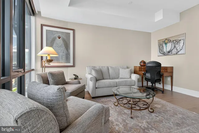 a room with gym equipment and a large window