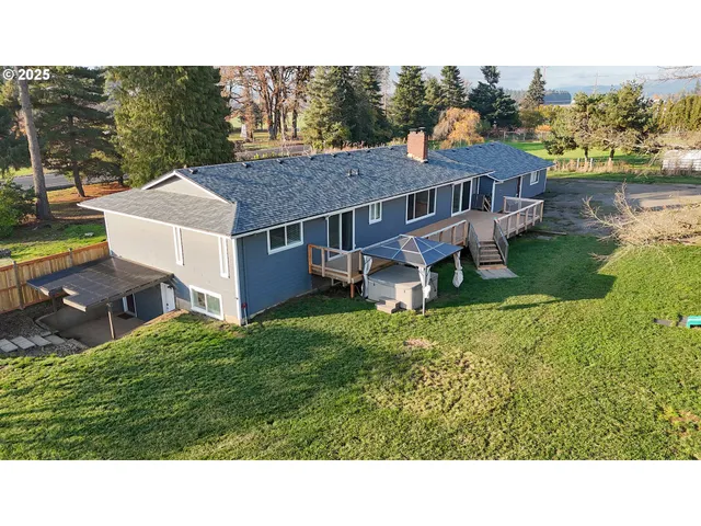 a aerial view of a house with a garden
