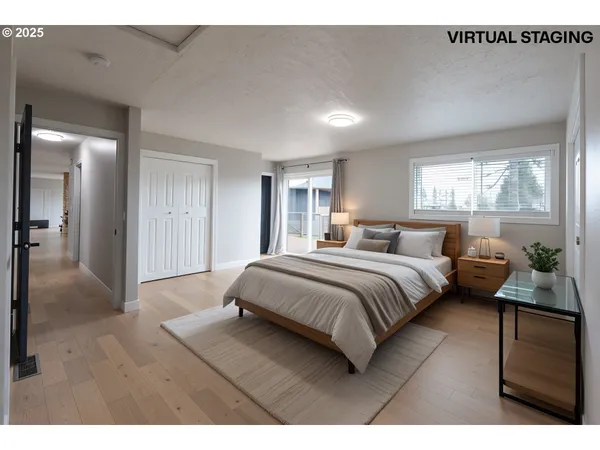 a bedroom with a bed and window