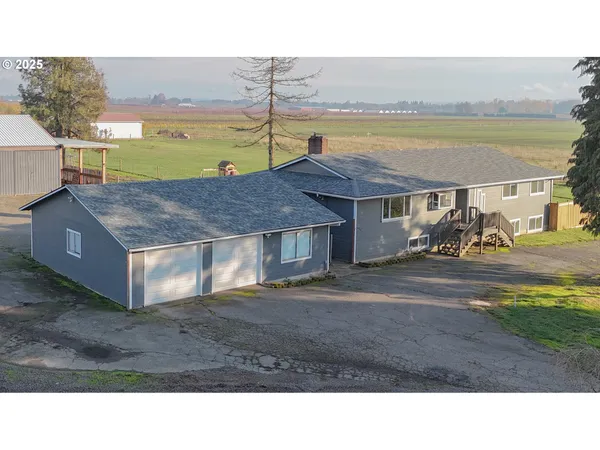 a black and white photo of a house