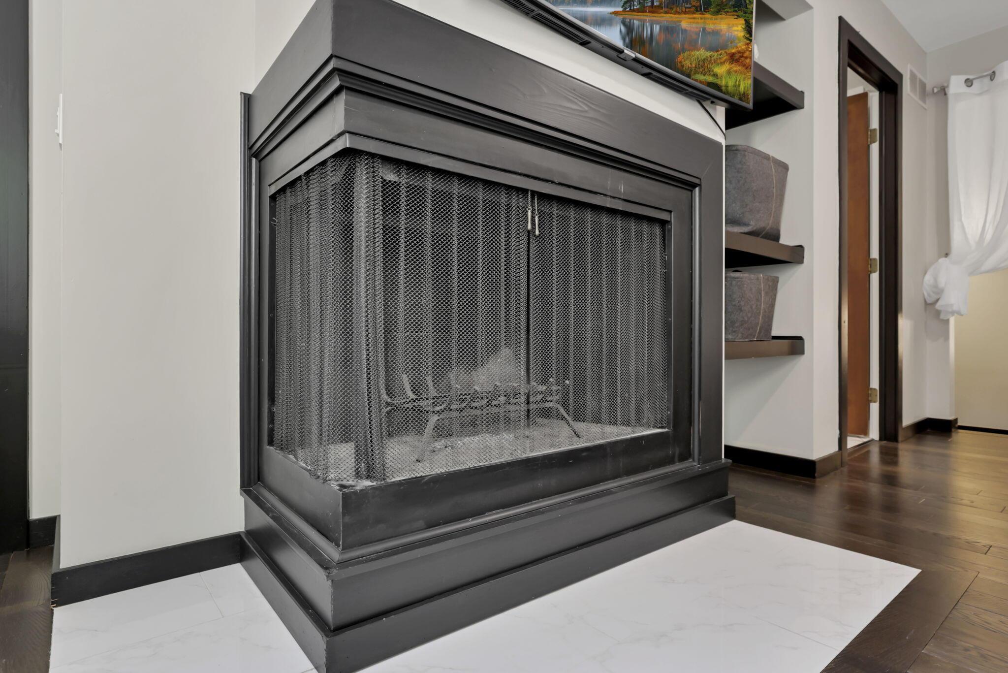 4390 Dublin Road Columbus, OH 43221 - Photo 43 of 83 2nd fireplace in prime bedroom for cozy winters.