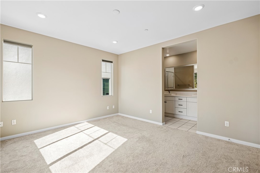 157 Terrapin Irvine, CA 92618 - Photo 13 of 19 an empty room with windows and wardrobe
