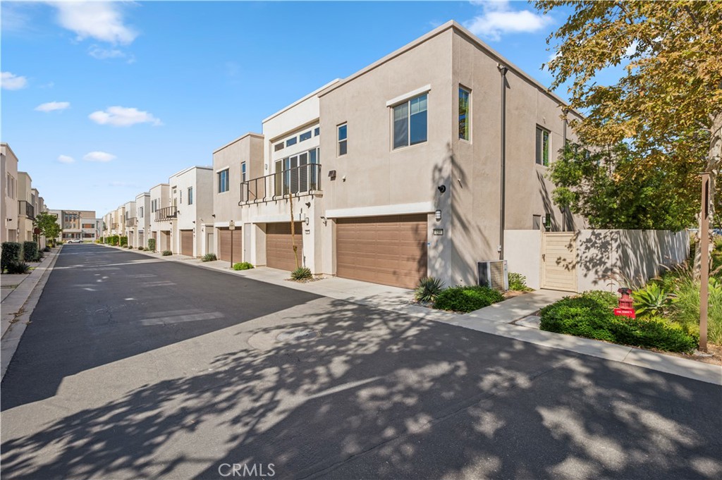 157 Terrapin Irvine, CA 92618 - Photo 19 of 19 a view of a white house with a yard