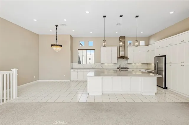 a bathroom with double vanity sink and mirror
