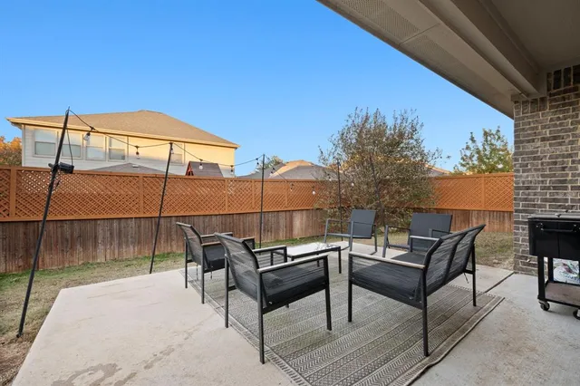 a house view with a backyard space