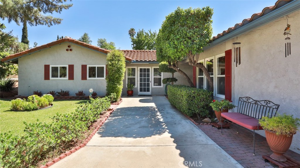18399 Roberts Road Riverside, CA 92508 - Photo 1 of 1 a front view of a house with a yard