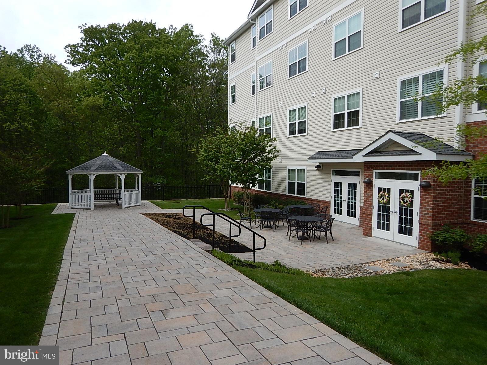 633 Wallingford Road, Unit 201 Bel Air, MD 21014 - Photo 28 of 38 a view of a house with a yard