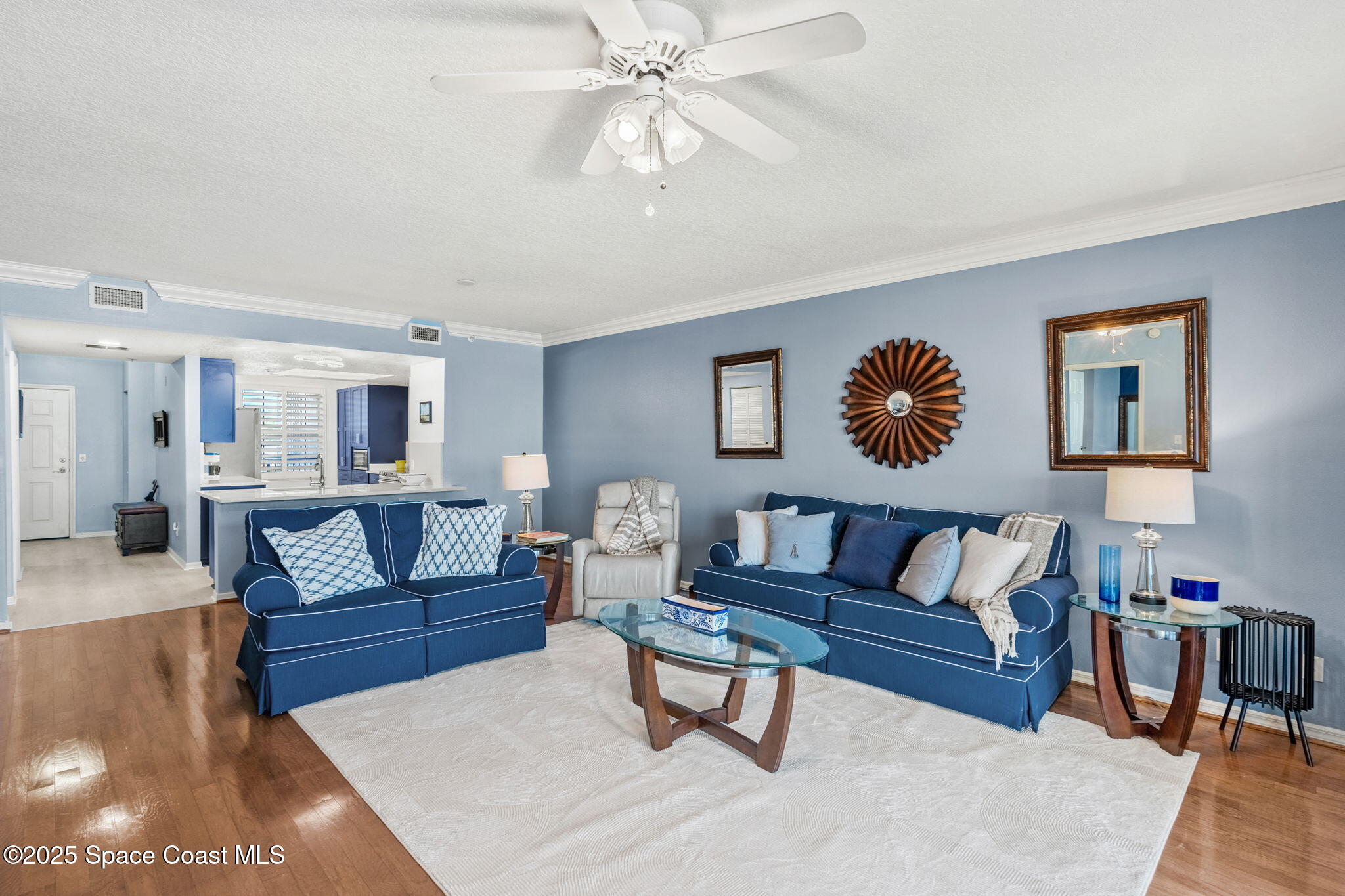 100 Riverside Drive, Unit 405 Cocoa, FL 32922 - Photo 17 of 90 a living room with furniture and a rug