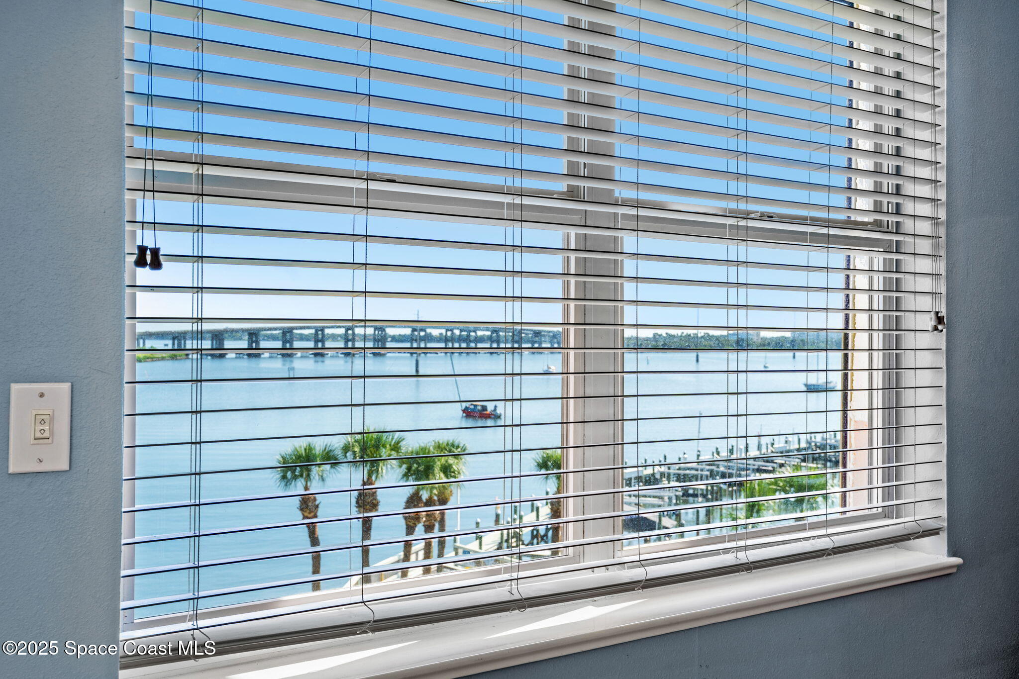 100 Riverside Drive, Unit 405 Cocoa, FL 32922 - Photo 22 of 90 a view of a window with a pot