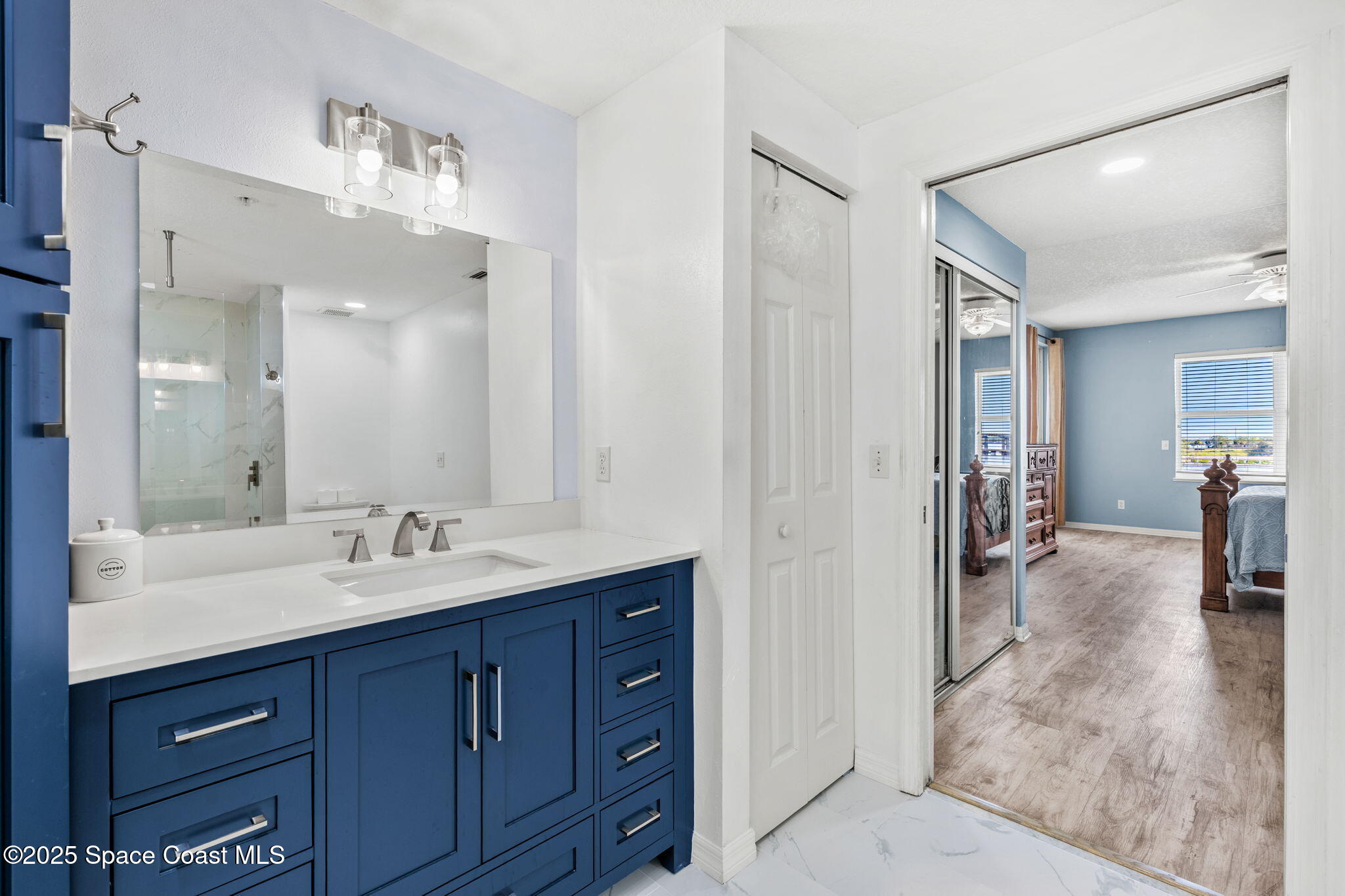 100 Riverside Drive, Unit 405 Cocoa, FL 32922 - Photo 24 of 90 a spacious bathroom with a double vanity sink mirror and shower