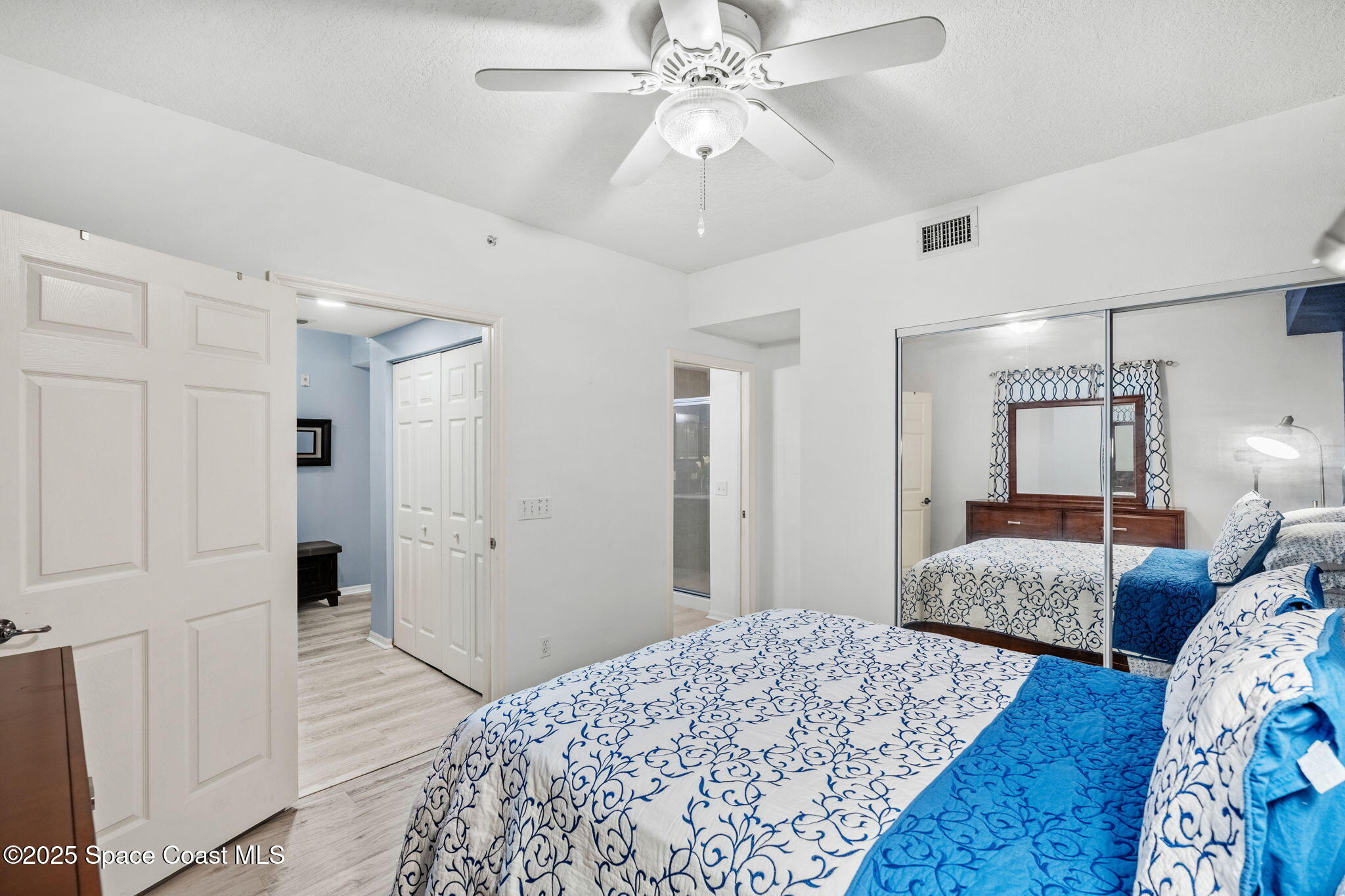 100 Riverside Drive, Unit 405 Cocoa, FL 32922 - Photo 28 of 90 a bedroom with bed and window