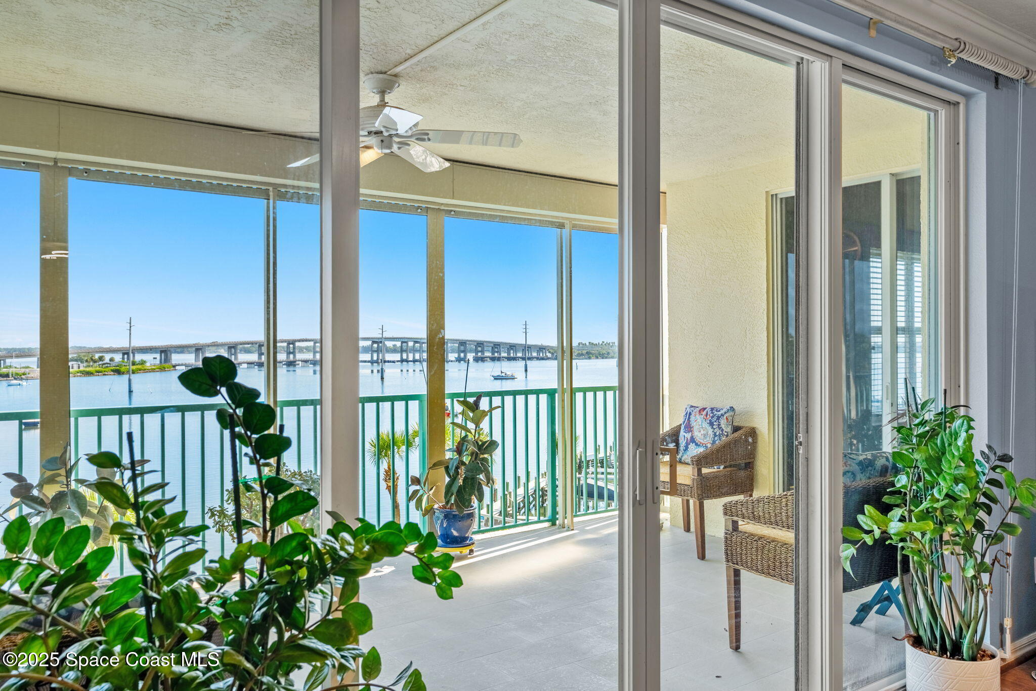100 Riverside Drive, Unit 405 Cocoa, FL 32922 - Photo 32 of 90 a view of a balcony with potted plants