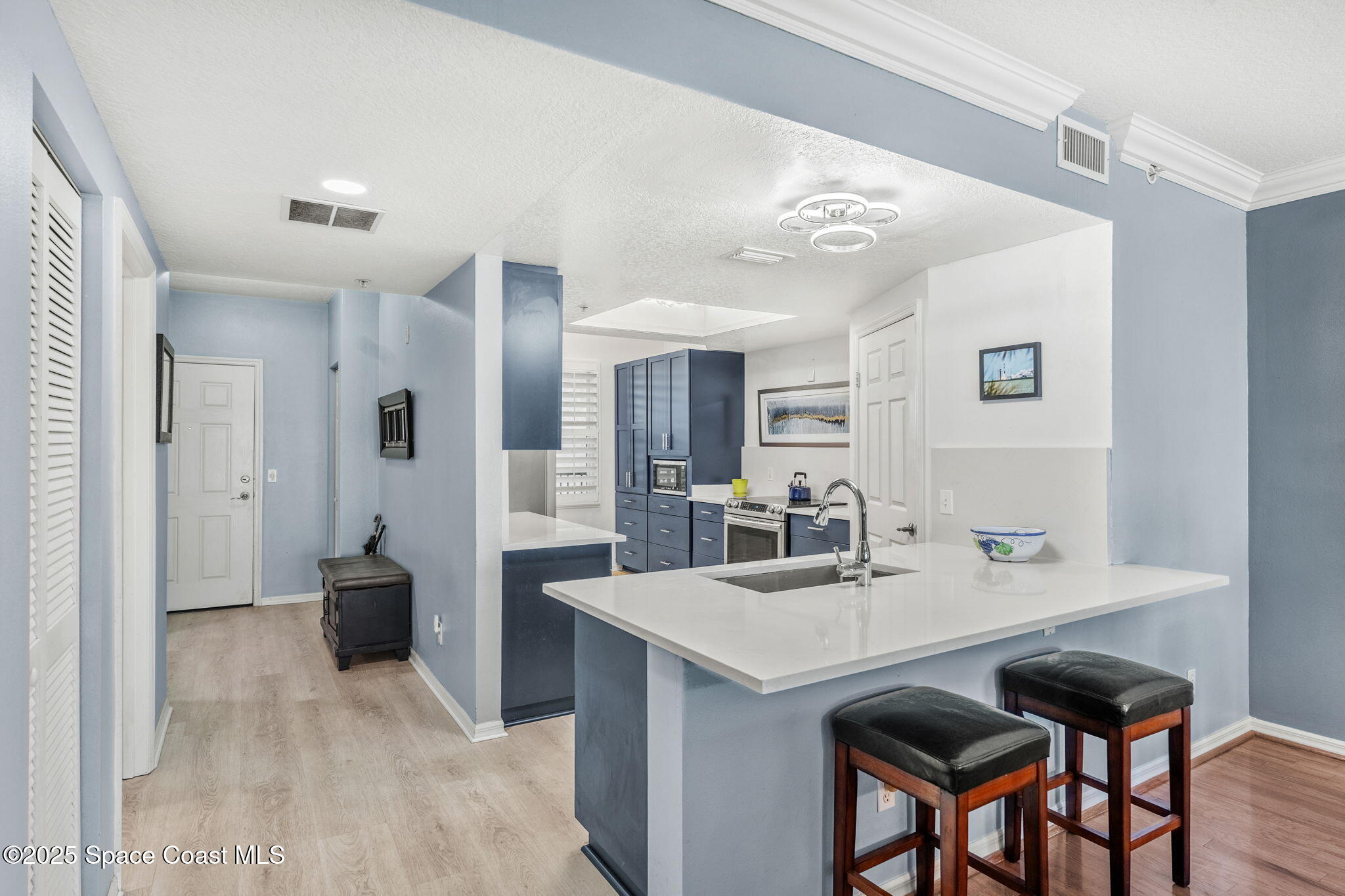 100 Riverside Drive, Unit 405 Cocoa, FL 32922 - Photo 6 of 90 Foyer/Kitchen Views