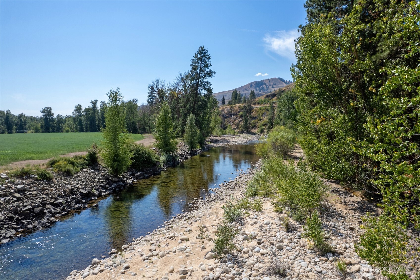 600 West Chewuch Road Winthrop, WA 98862 - Photo 12 of 20 a view of a lake with a mountain in the background