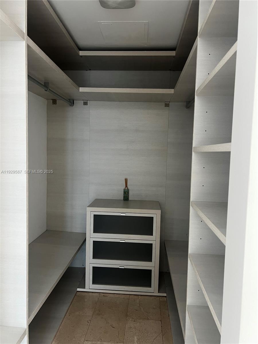 68 Southeast 6th Street, Unit 3401 Miami, FL 33131 - Photo 15 of 23 a view of walk in closet