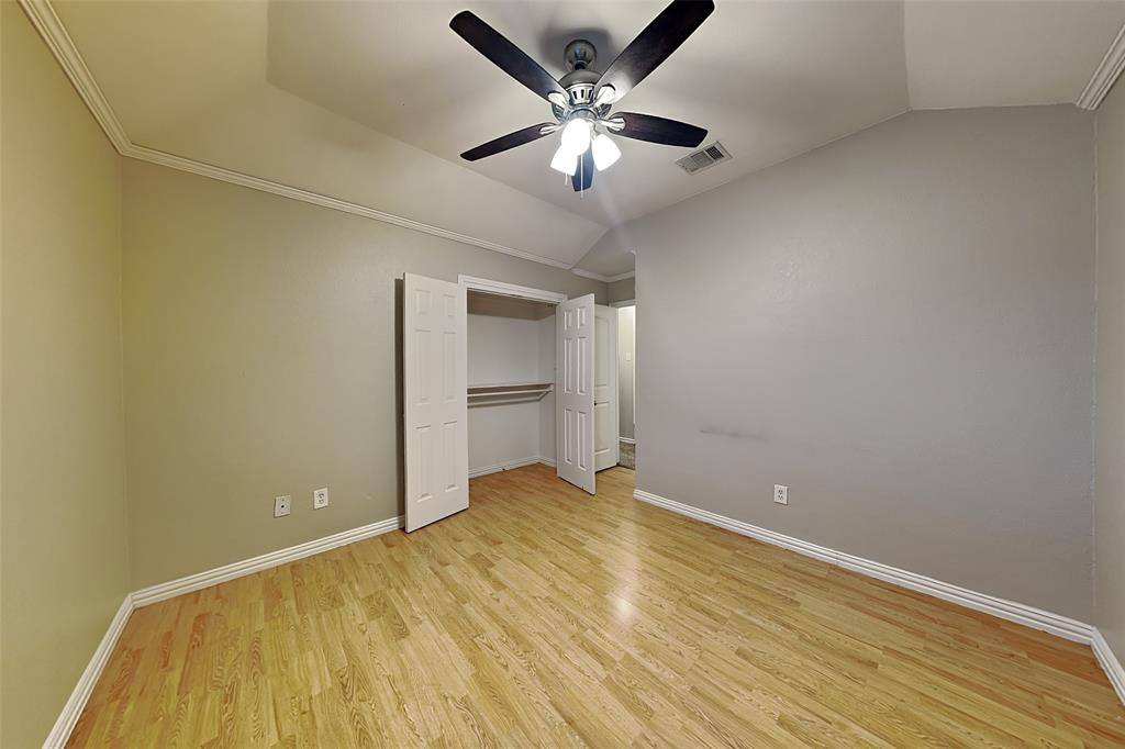 1213 Broken Arrow Trail Carrollton, TX 75007 - Photo 12 of 19 wooden floor in an empty room