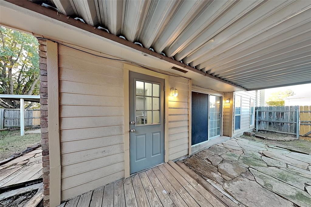 1213 Broken Arrow Trail Carrollton, TX 75007 - Photo 15 of 19 a view of a porch
